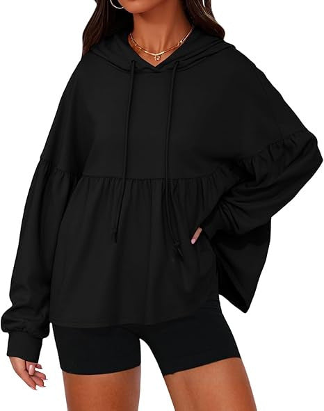 Solid color hooded top with large ruffled sleeves