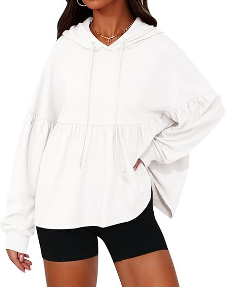 Solid color hooded top with large ruffled sleeves